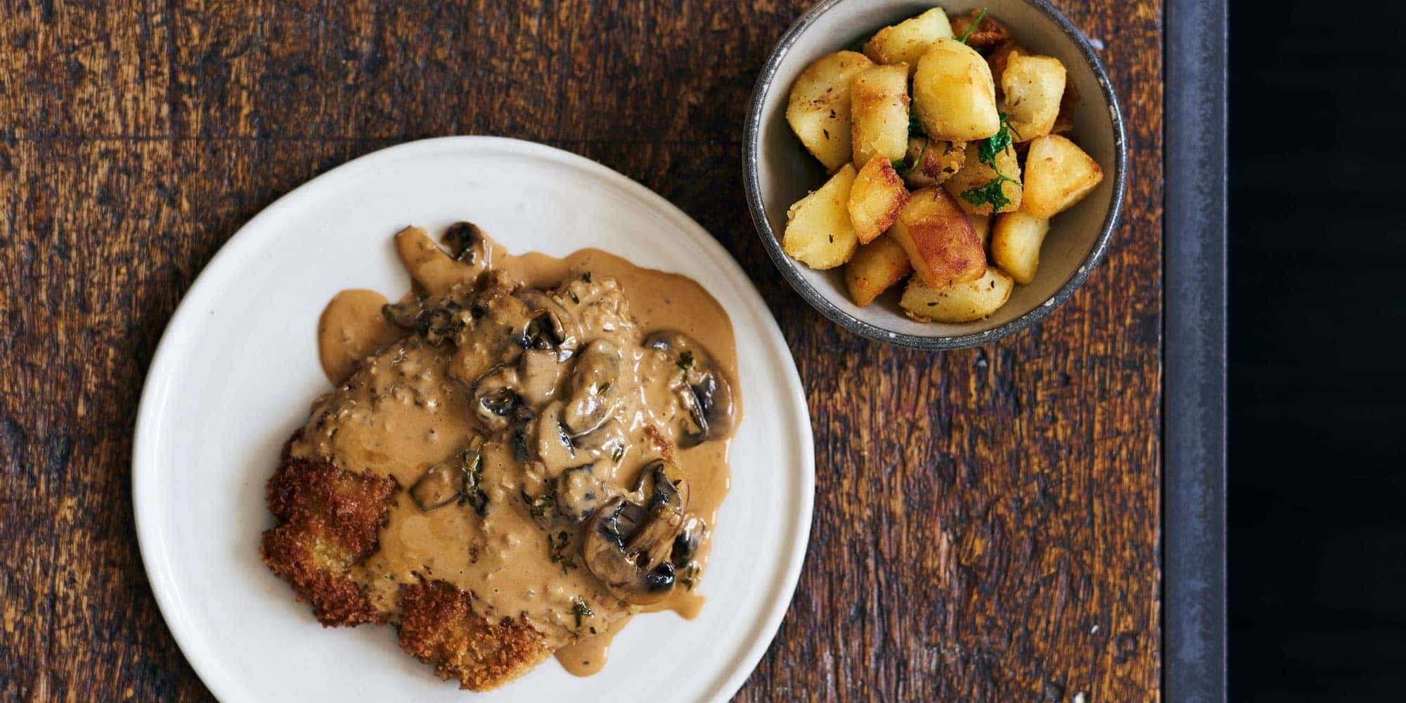 Pork schnitzel with hunter sauce